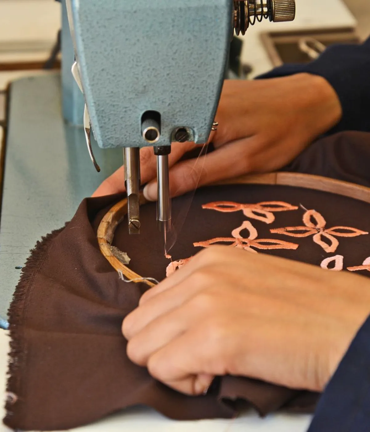 Embroidery being stitched on a machine